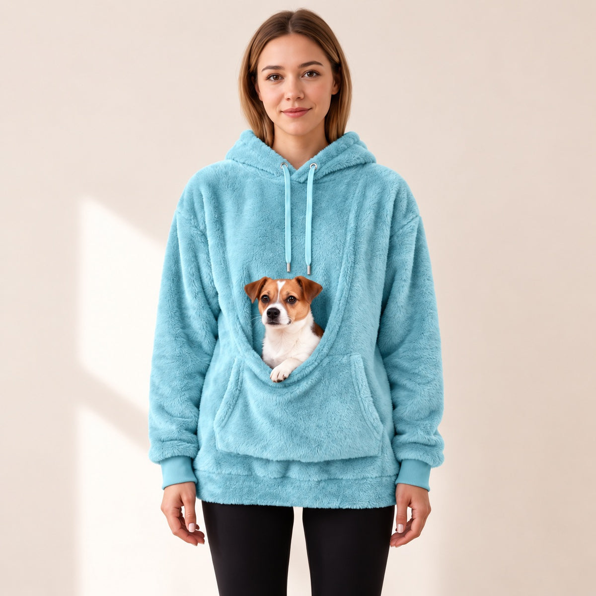 CuddleCarry pet carrier hoodie in Sky Blue with a small dog peeking out of the front pouch